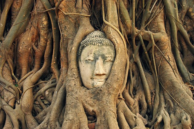 Ayutthaya Sunset Tour: UNESCO Temples & Peaceful River Cruise - Wat Yai Chai Mongkol and its giant reclining Buddha