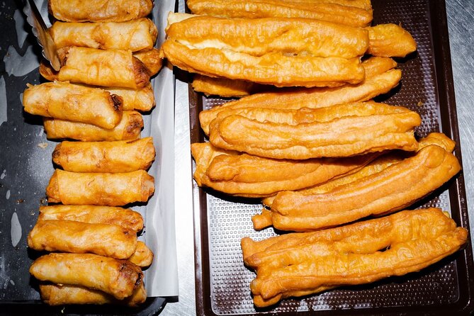 Baba Tastes Phuket Food Tour with 15+ Tastings - Stop one: meeting near Jui Tui Temple