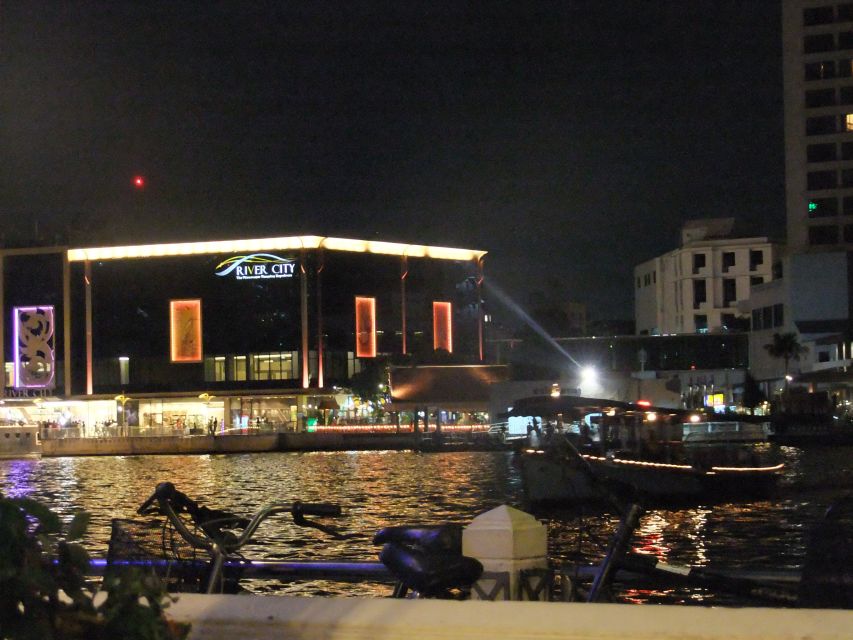 Bangkok by Night Cycling Tour with Street-food Meal - River views from the ferry and the riverbank