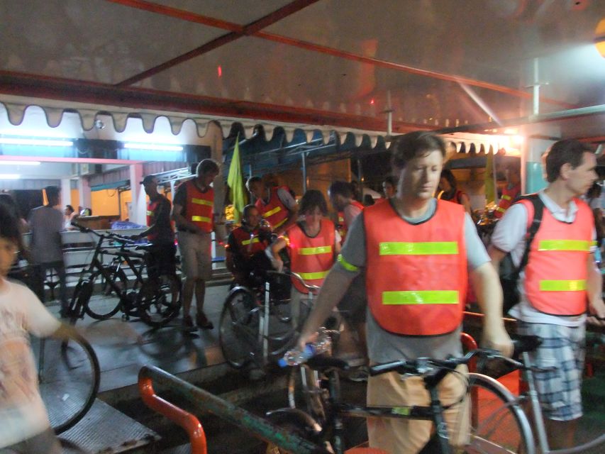 Bangkok by Night Cycling Tour with Street-food Meal - What the guides add to the $45 price
