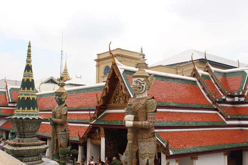 Bangkok: Grand Palace, Wat Pho, Wat Arun Sacred & Local Tour - Wat Pho and the 46-meter Reclining Buddha