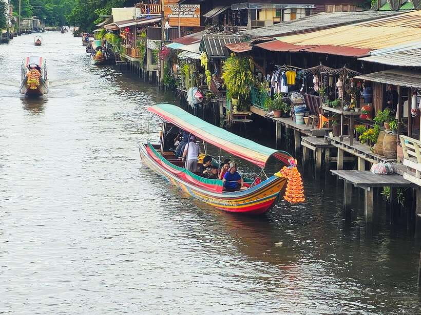 Bangkok Long Boat Canal a Big Buddha & Culture Markets Tour - Seeing Wat Paknam’s Big Buddha from the water