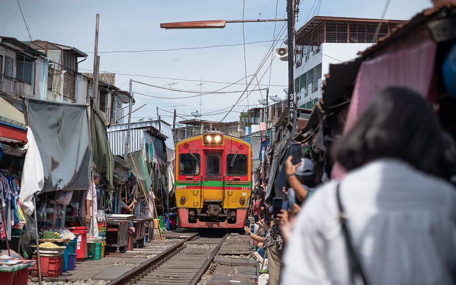 Bangkok: Maeklong Railway Market and Amphawa Floating Market - A banyan tree temple breaks up the market visits