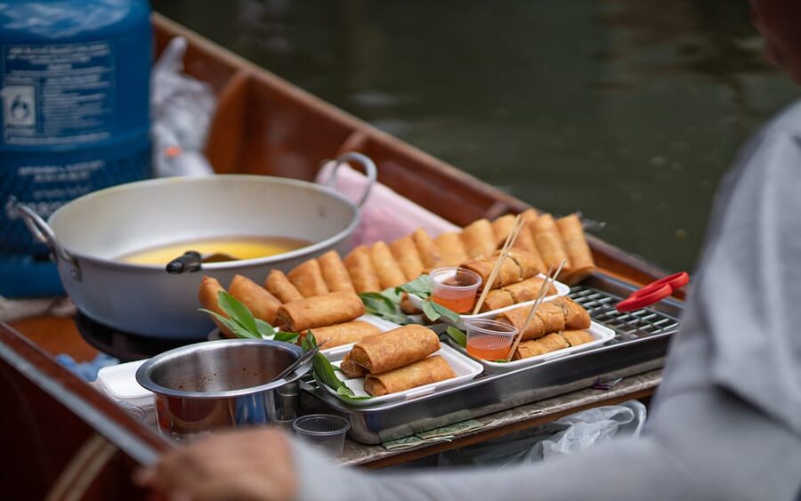 Bangkok: Maeklong Railway Market and Amphawa Floating Market - Amphawa Floating Market brings food, boats, and evening light