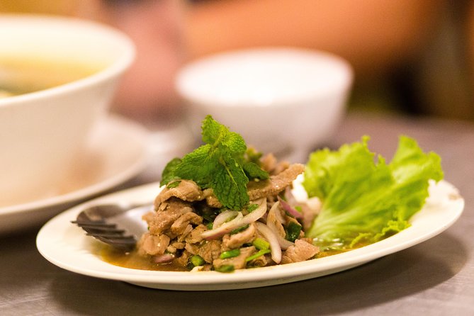 Bangkok Midnight Food Tuk Tuk Tour - Stop two: Northeastern Thai food in Pathum Wan