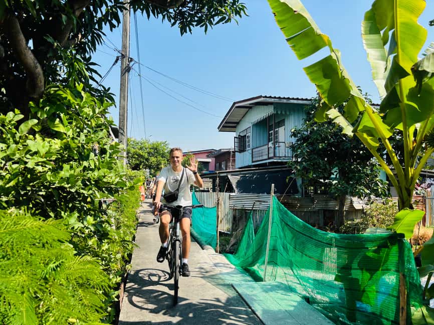 Bangkok: Temples, Canals & Local Life Bike Tour - Wat Nak Prok adds another temple landmark