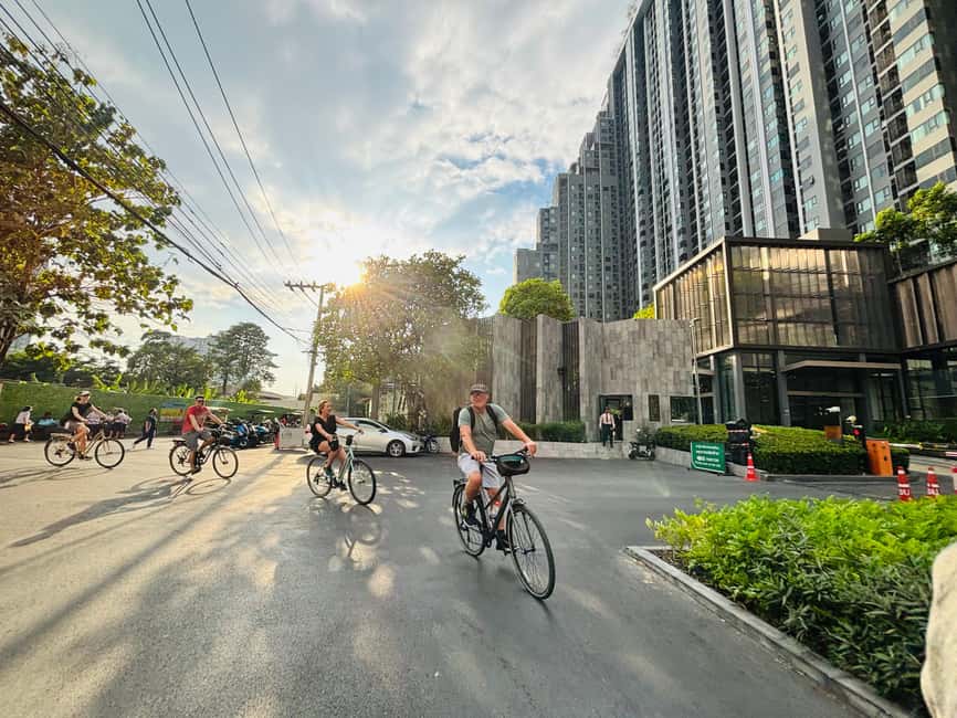 Bangkok: Temples, Canals & Local Life Bike Tour - Narrow lanes and traffic require attention