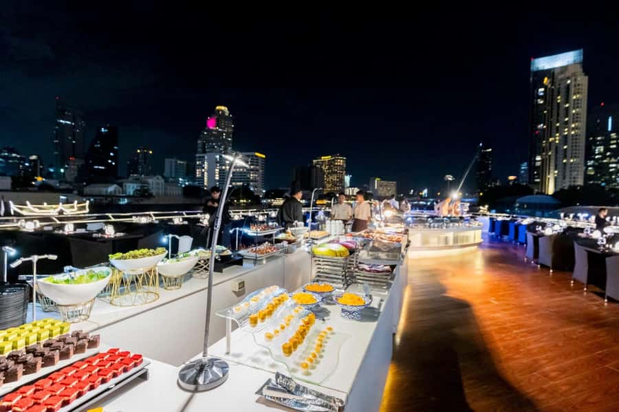 Bangkok: The Opulence Buffet Dinner Cruise with Live Band - The open upper deck and Bangkok after dark