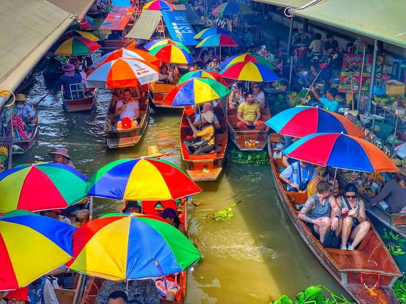 Bangkok: Train Market & Floating Market with Boat Ride - Watching the train pass through Maeklong