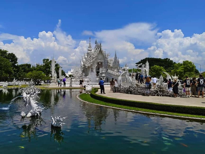 Chiang Mai: Chiang Rai Red, White, and Blue Temples day tour - Mae Kachan Hot Spring: a brief roadside pause