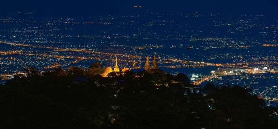 Chiang Mai: Doi Suthep & Wat Umong Twilight Tour with Pickup - Doi Suthep after dark: Chiang Mai below the mountain
