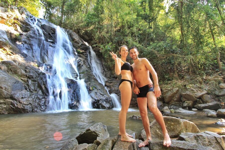 Chiang Mai: Guided Jungle and Waterfall Trek with Transfer - Small bamboo crafts make the walk memorable
