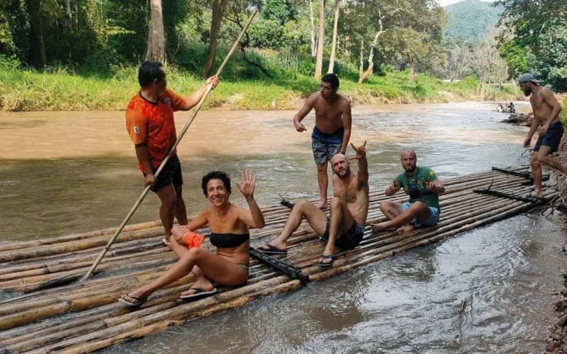 Chiang Mai: Jungle Trek, Elephants care & Bamboo Rafting - Bamboo rafting on a quiet jungle river