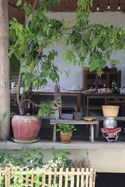 Chiang Mai : Traditional Northern Cooking Class - A porch, charcoal fire, and family-style teaching