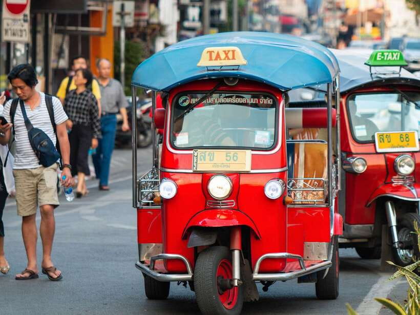 Chiang Mai: Tuk-Tuk Evening Tour with Temples & Street Foods - Wat Suan Dok and its field of white chedis
