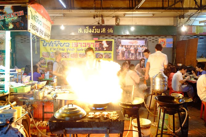 Discover Bangkok at Night 5-Hour Bike Tour with dinner - Wat Phra Chetuphon, with one important limitation