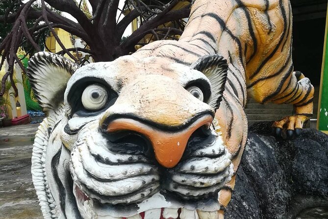 Discover Krabi - Emerald Pool, Hot Springs & Tiger Cave Temple - Tiger Cave Temple: a spiritual site with a punishing staircase