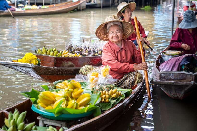 From Bangkok: Railway & Damnoen Saduak Floating Market Tour - Mae Klong Railway Market and the train passage
