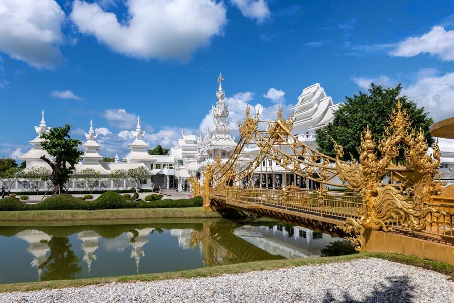 From Chiang Mai: Chiang Rai's Temples Exploration Day Trip - The Red Temple and its bold spiritual artwork