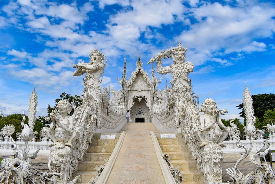 From Chiang Rai: Famous Temples and Golden Triangle Day Tour - Possible extra stops: Mae Sai, tea, Chiang Saen, and the Long Neck Village
