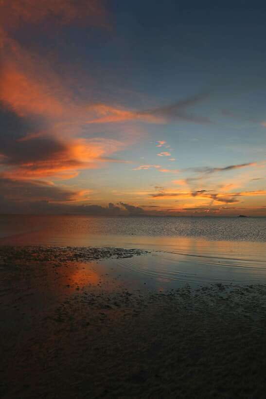 From Phi Phi: Full Day by Longtail Boat with Sunset - Sunset and glowing plankton finish the day