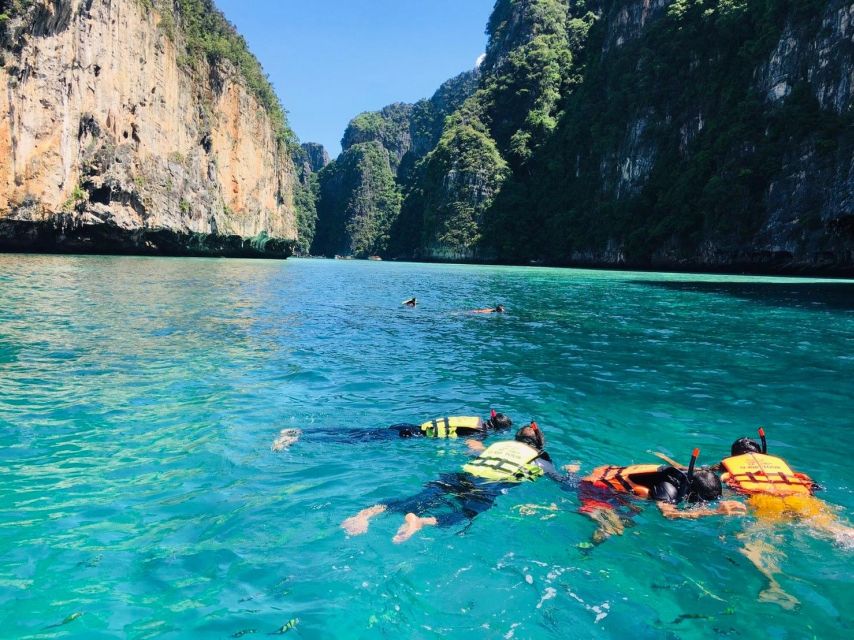 From Phi Phi: Half-Day Longtail Boat Tour with Snorkeling - Maya Bay: famous for good reason, crowded for the same reason
