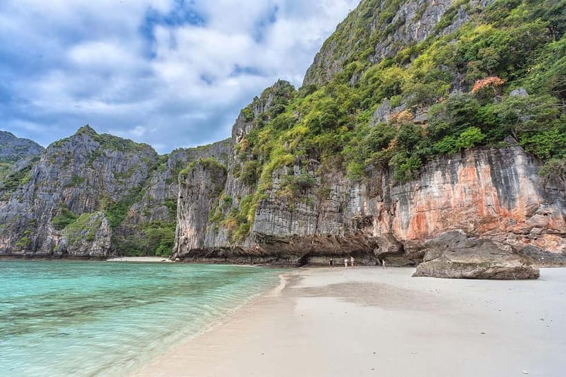 From Phi Phi: Sunset & Plankton Swim Tour By Speedboat - Viking Cave from the water