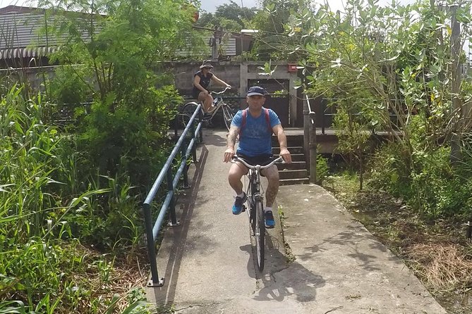 Half-Day Bangkok Bike Tour Including Lunch - Wat Tha Phra, turtles, and living religion