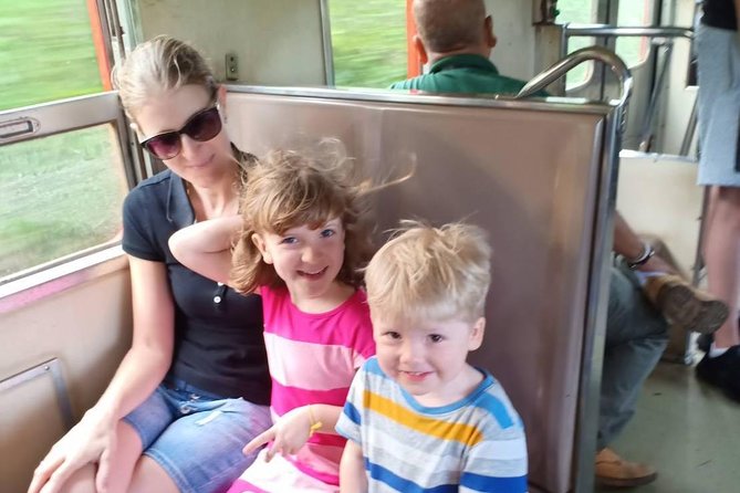 Half-Day Railway Market and Floating Market Tour in Thailand - The train that cuts through Maeklong Market