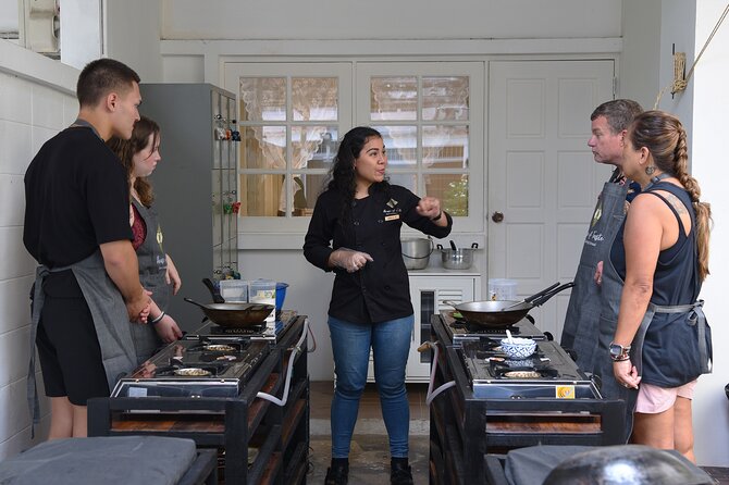Hands-on Thai Cooking Class & Market Tour in Sukhumvit - Your own station and a social meal