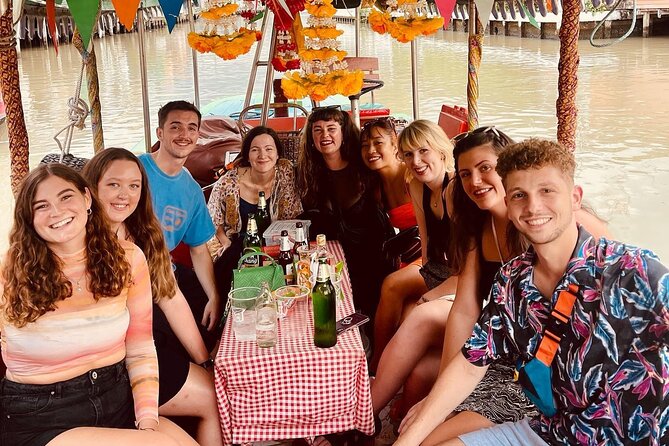 Hidden Bangkok Longtail Boat Tour to Big Buddha&Canal Life 2hrs - Turning toward the Chao Phraya and Wat Arun