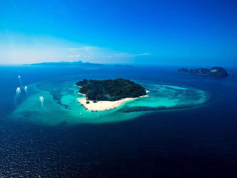 Ko Lanta: Full-Day Snorkel Trip to Phi Phi & Bamboo Islands - Phi Phi Don gives you a short look at island life