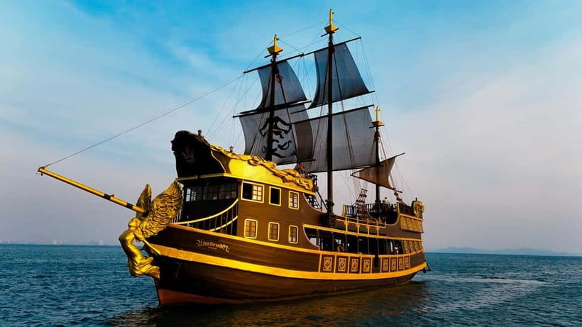 Pattaya: Koh Larn Pirate Cruise with Transfer & Activities - Koh Sak around 1:00 PM: beach chairs and the first water activities