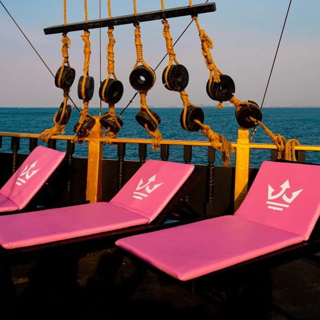 Pattaya: Koh Larn Pirate Cruise with Transfer & Activities - What the crew and language support add