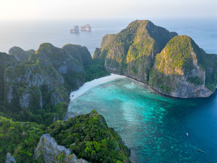Phi Phi: Maya Bay, Bamboo Island & Plankton Full-Day Tour - Sunset at sea and the plankton finale