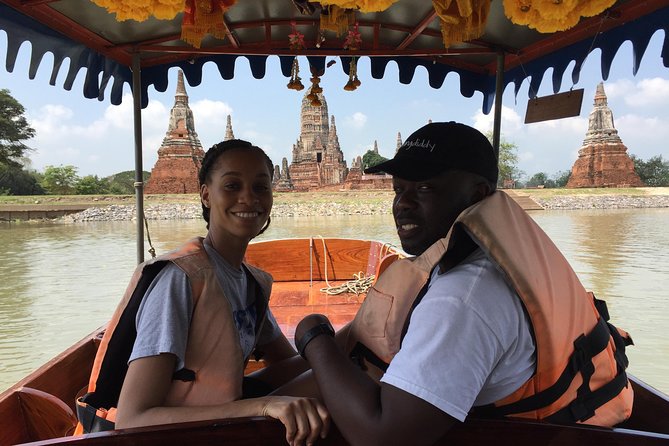 Private Excursion to Ayutthaya, UNESCO World Heritage site with Boat Tour - Wat Mahathat and the Buddha Head in the Roots