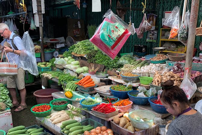 Thai Cooking Class with Market Visit by Maliwan - Taking a tuk-tuk to a real neighborhood market